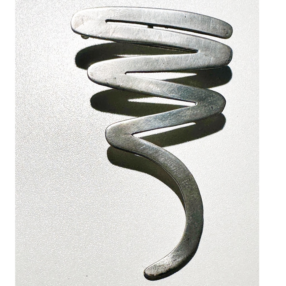 Elegant Silver Swirl Brooch